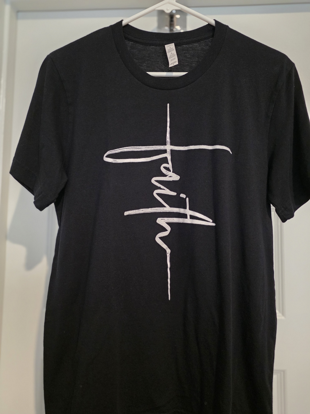 Women's Black Graphic Tee with Vertical Script